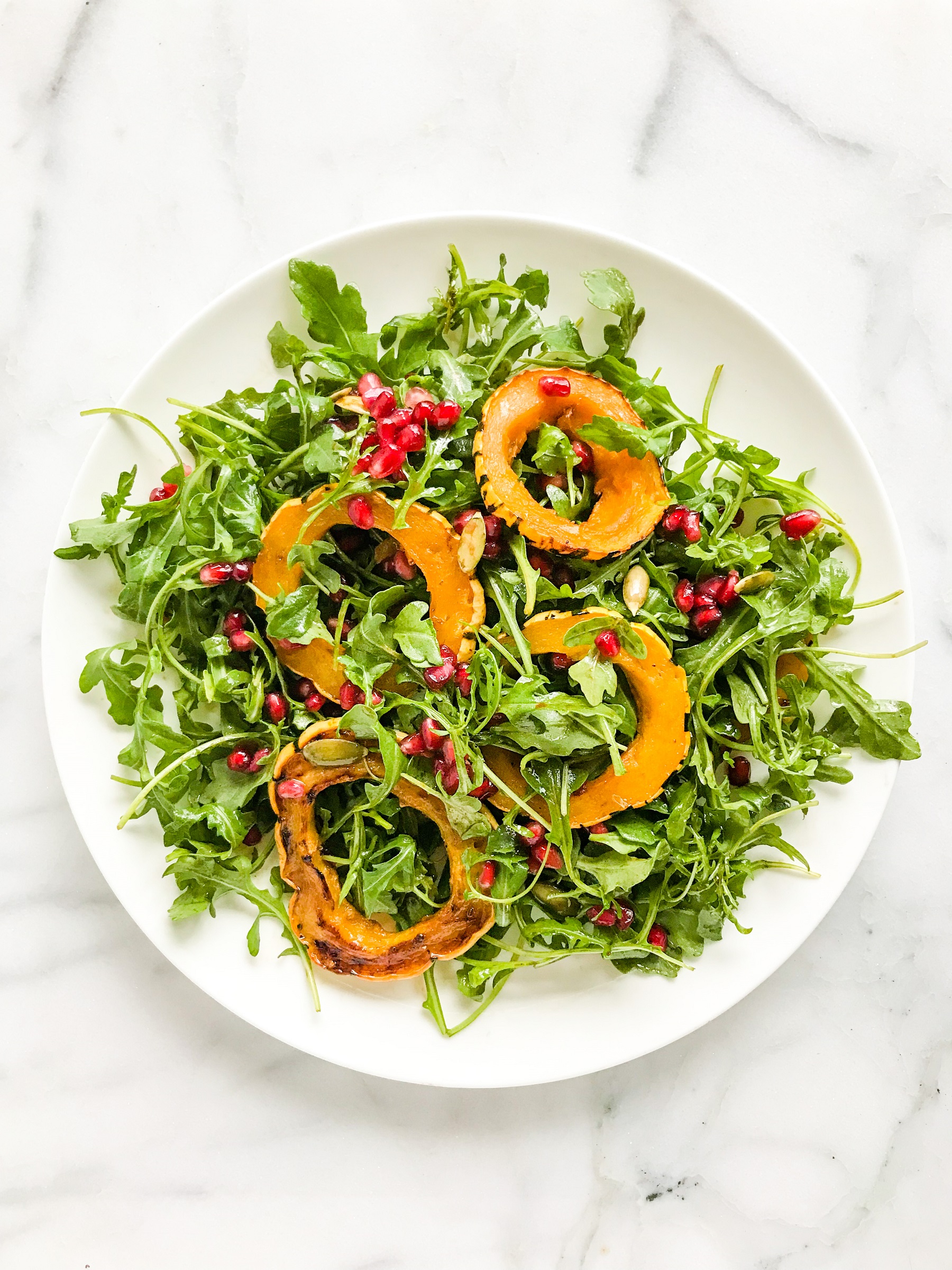 Roasted Delicata Squash and Pomegranate Arugula Salad | Living Well With Nic