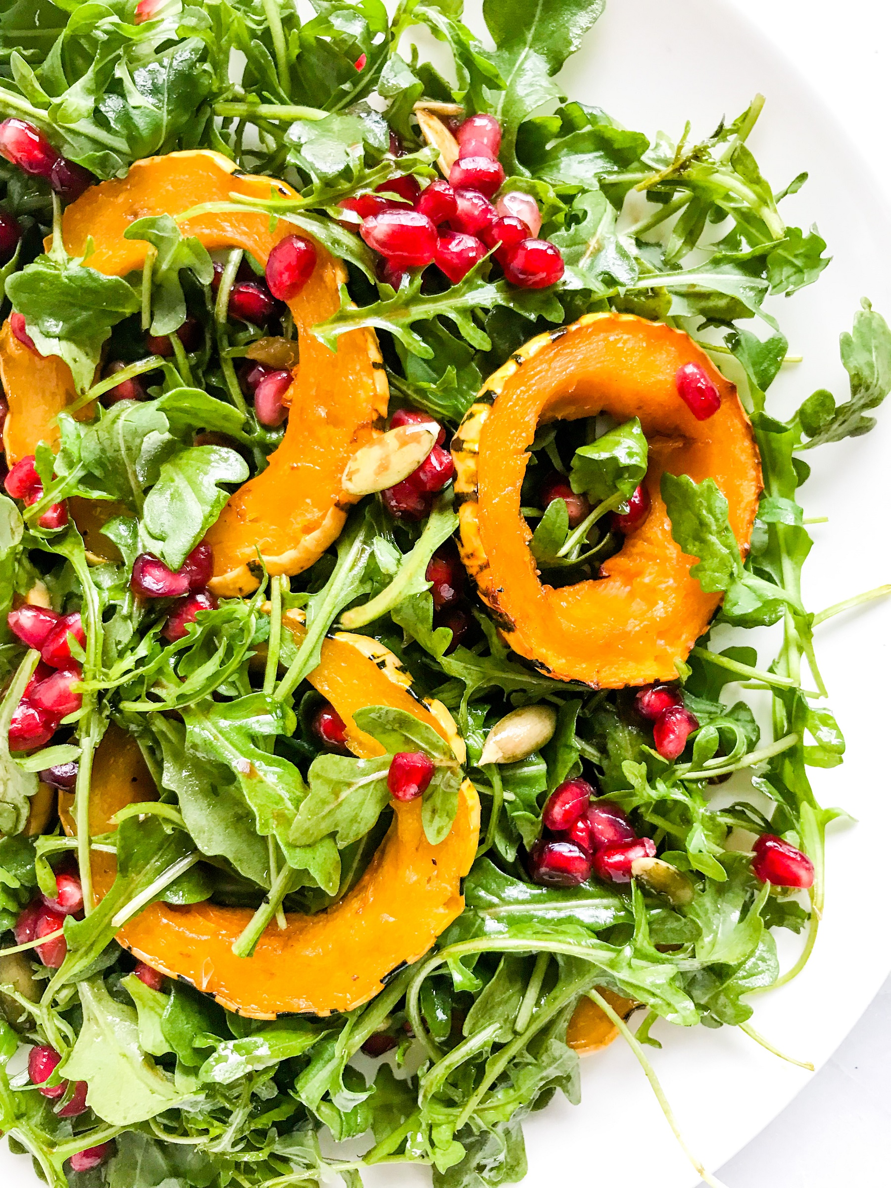 Roasted Delicata Squash and Pomegranate Arugula Salad | Living Well With Nic